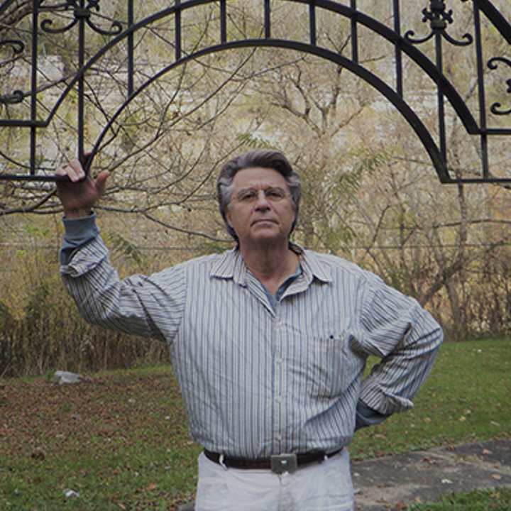 deans circle member randall bell, an older man standing outside